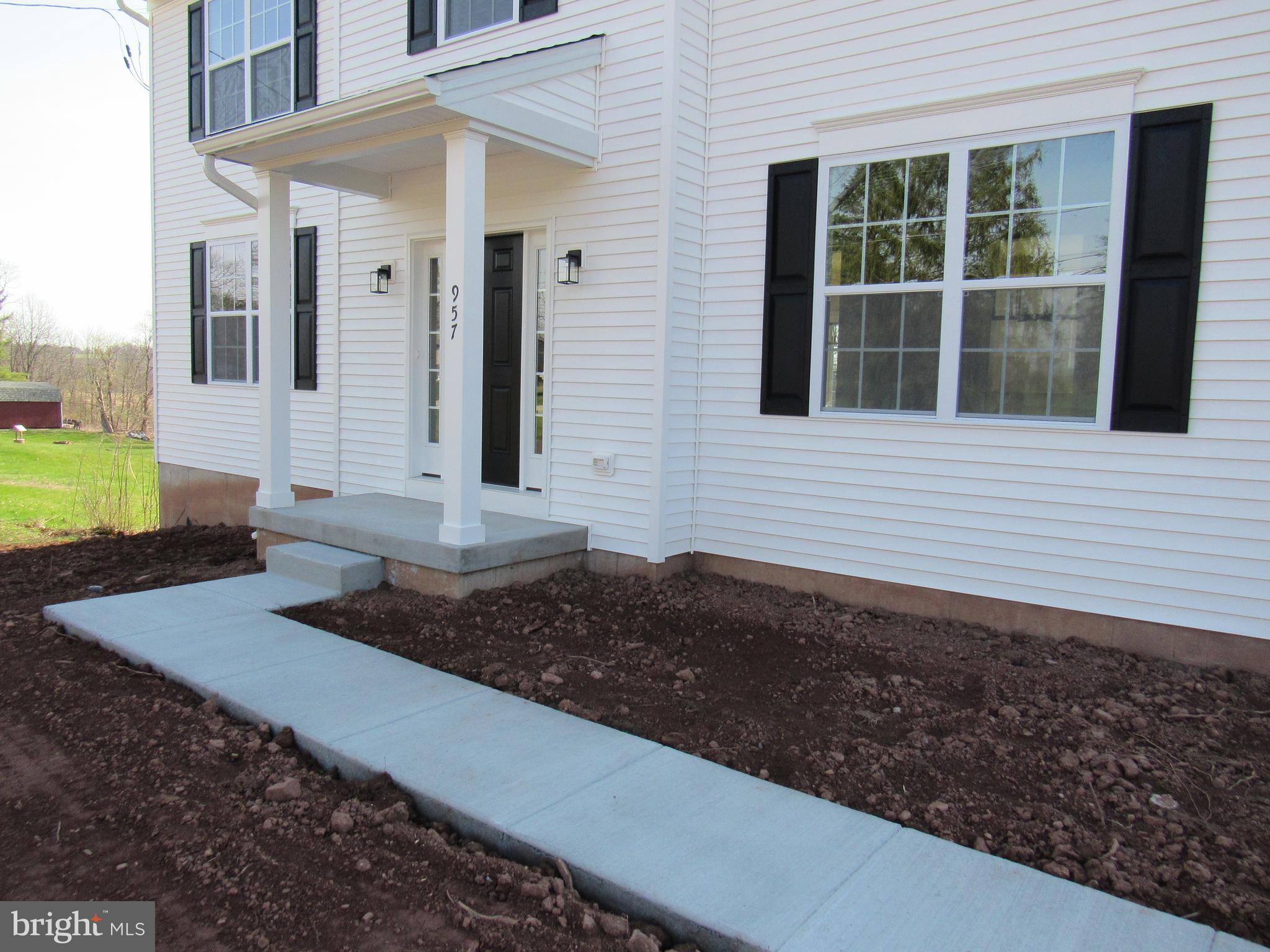 957 Spring City Road Phoenixville, PA 19460 - Photo 3 of 57 New sidewalk to front door