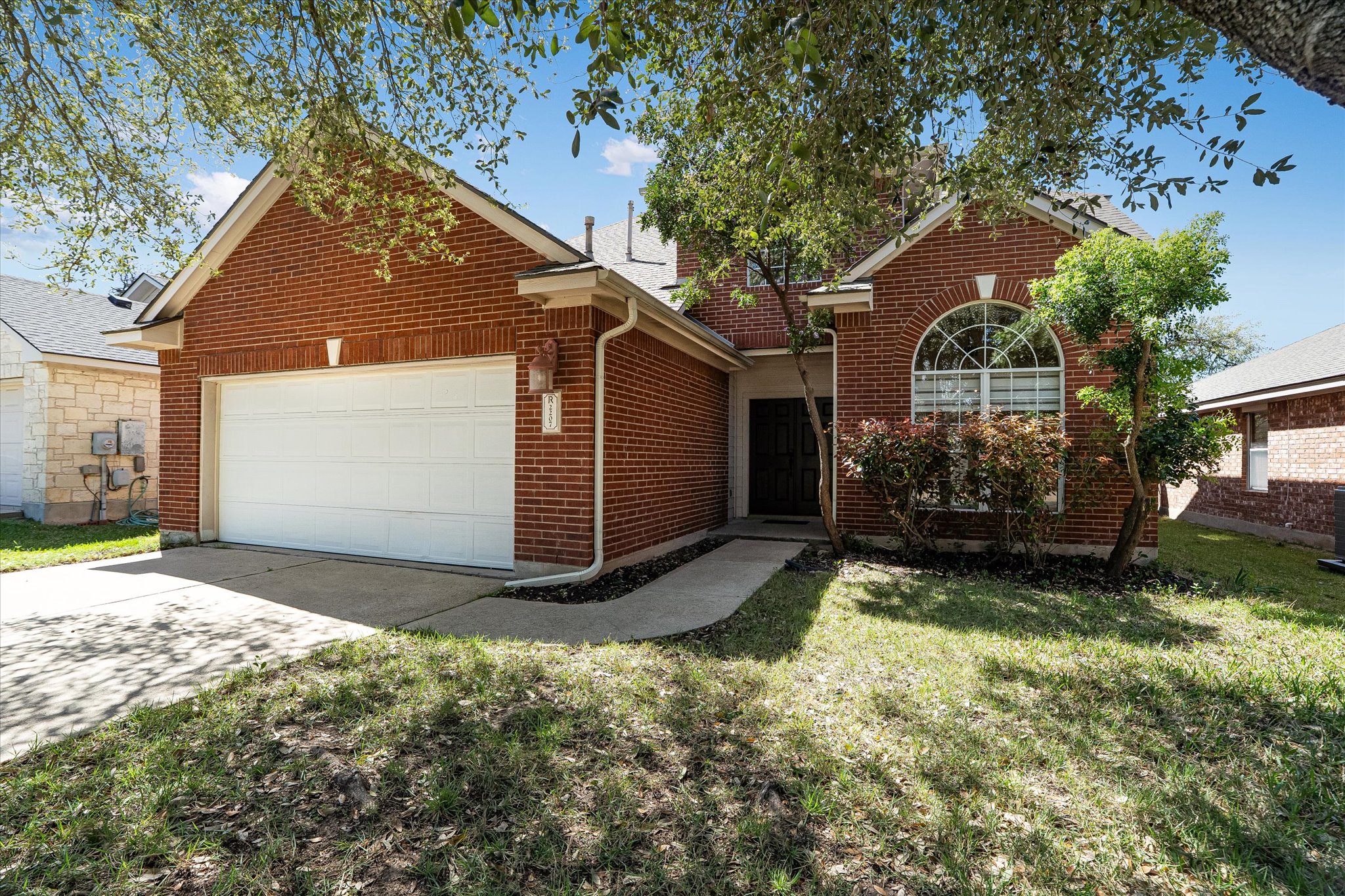 2207 Clover Ridge Drive Cedar Park, TX 78613 - Photo 1 of 25 Wonderful 2 Story brickhouse with great tree cover