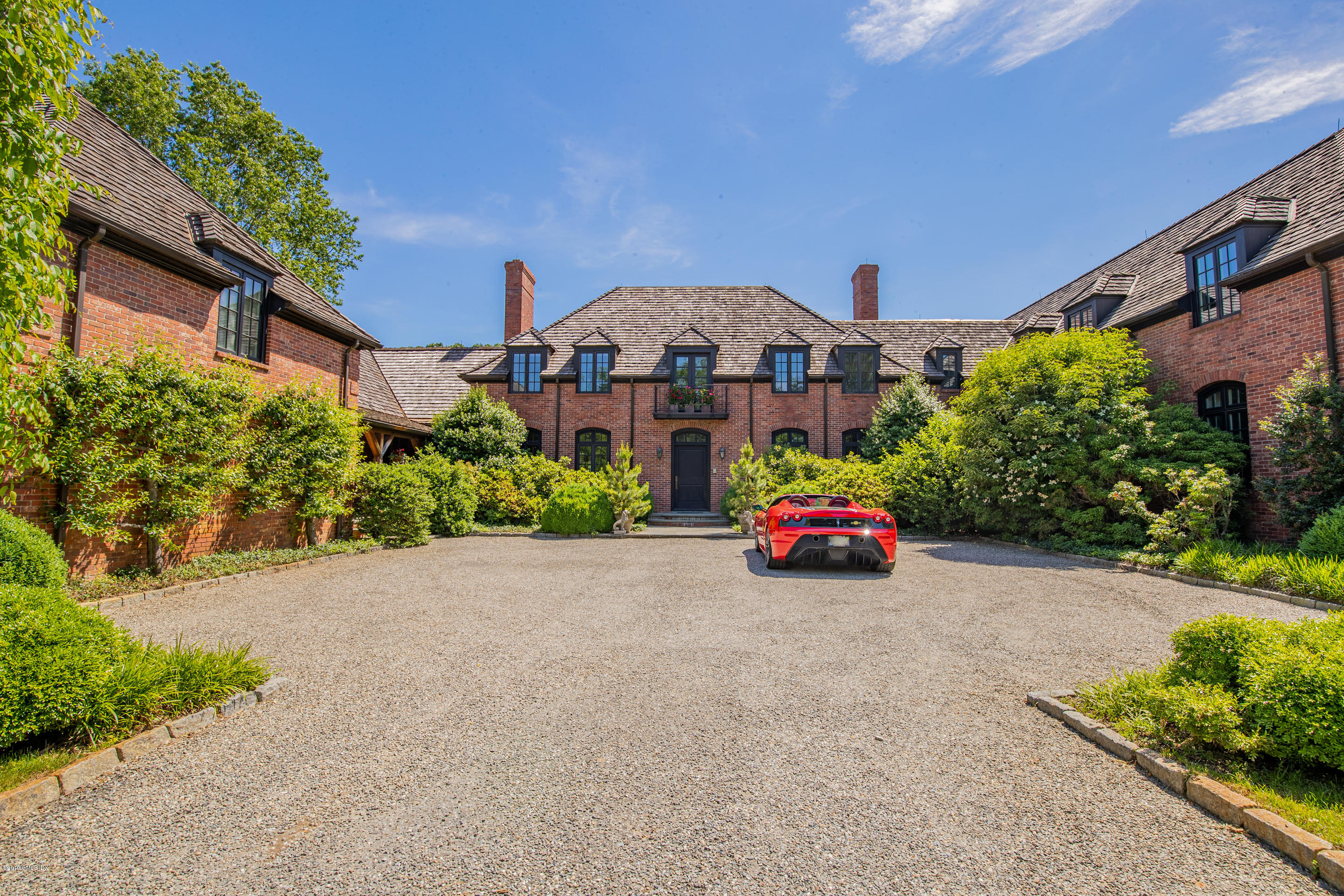55 Mooreland Road Greenwich, CT 06831 - Photo 14 of 43 front view of a house with a yard