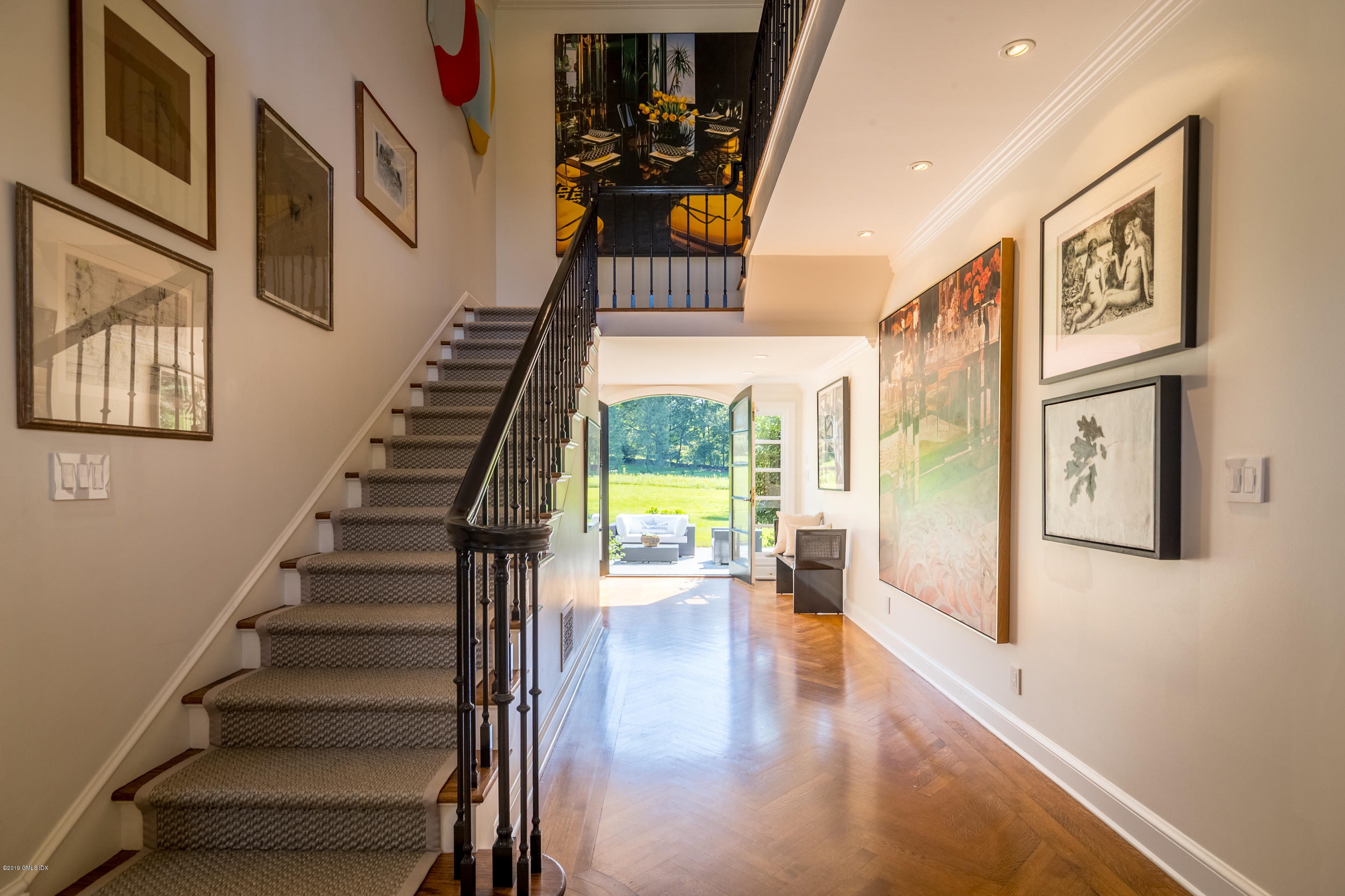 55 Mooreland Road Greenwich, CT 06831 - Photo 18 of 43 a view of entryway and hall with wooden floor
