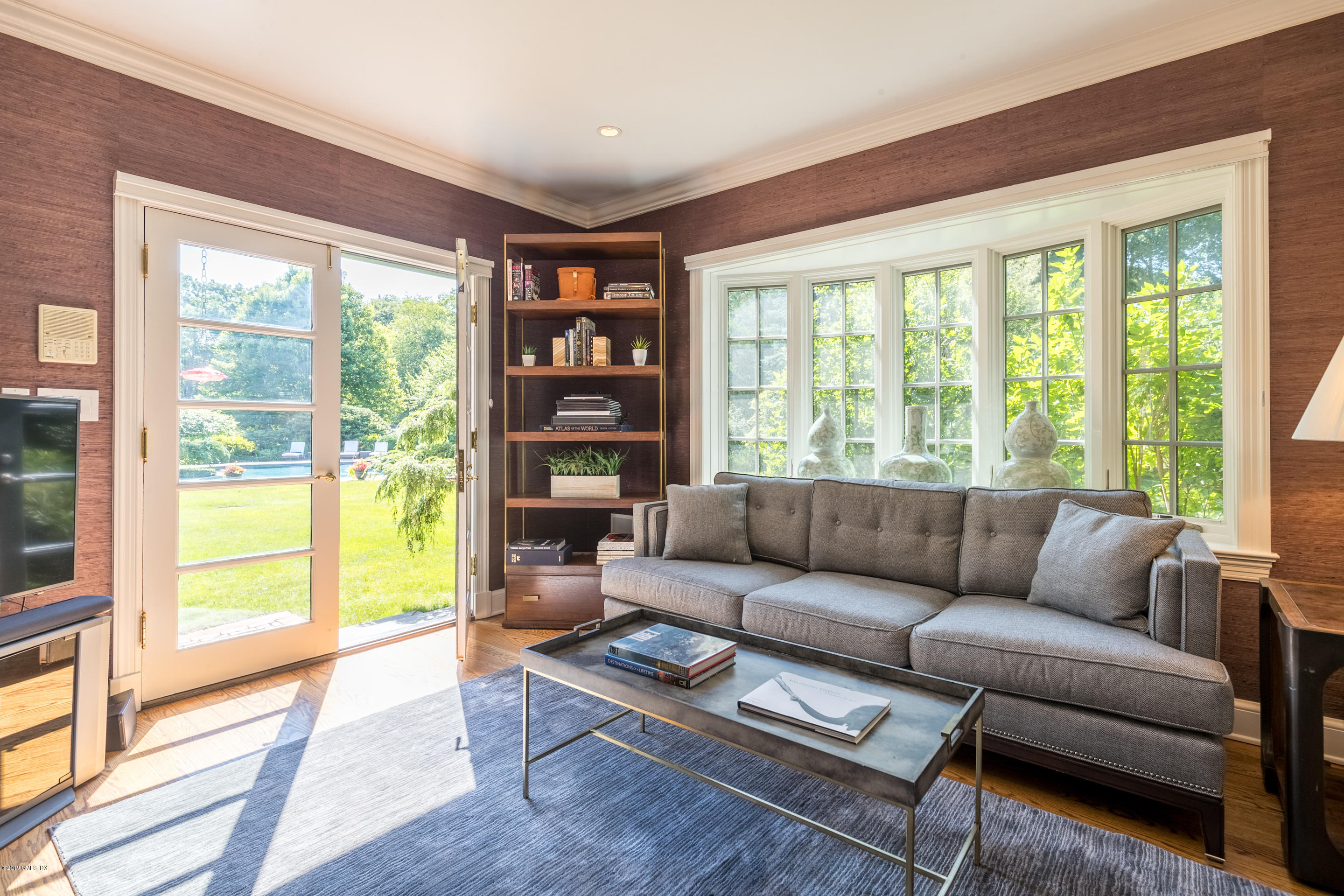 55 Mooreland Road Greenwich, CT 06831 - Photo 32 of 43 a living room with furniture and a large window