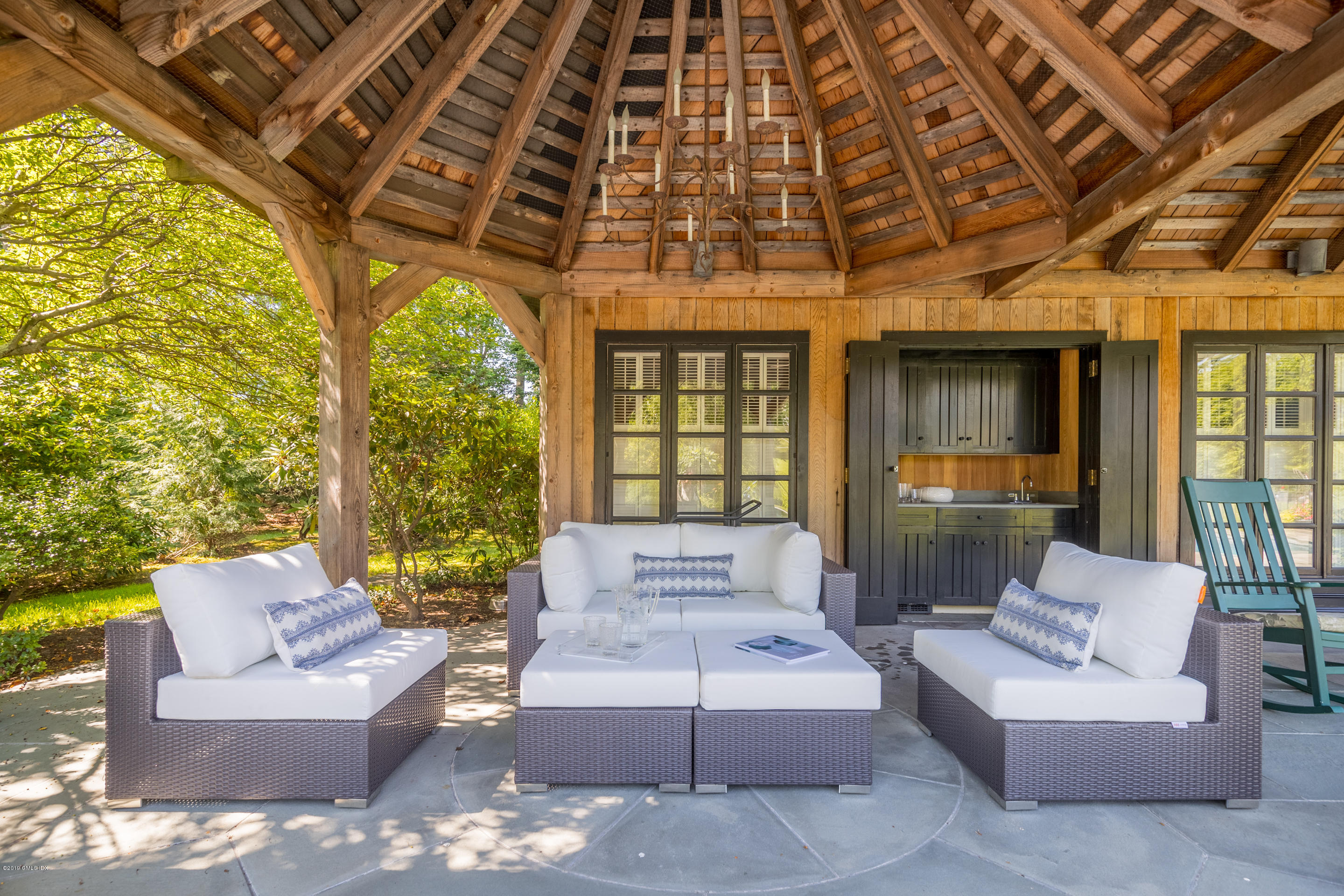 55 Mooreland Road Greenwich, CT 06831 - Photo 33 of 43 a view of a couches in a patio