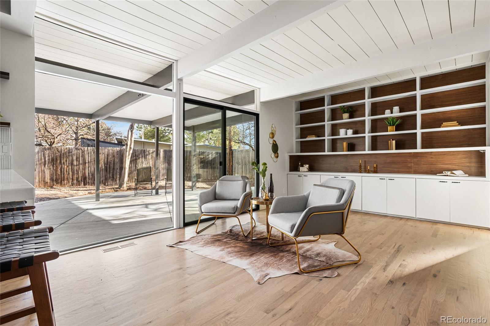 1812 South Ivanhoe Street Denver, CO 80224 - Photo 11 of 46 a workspace with furniture and a window