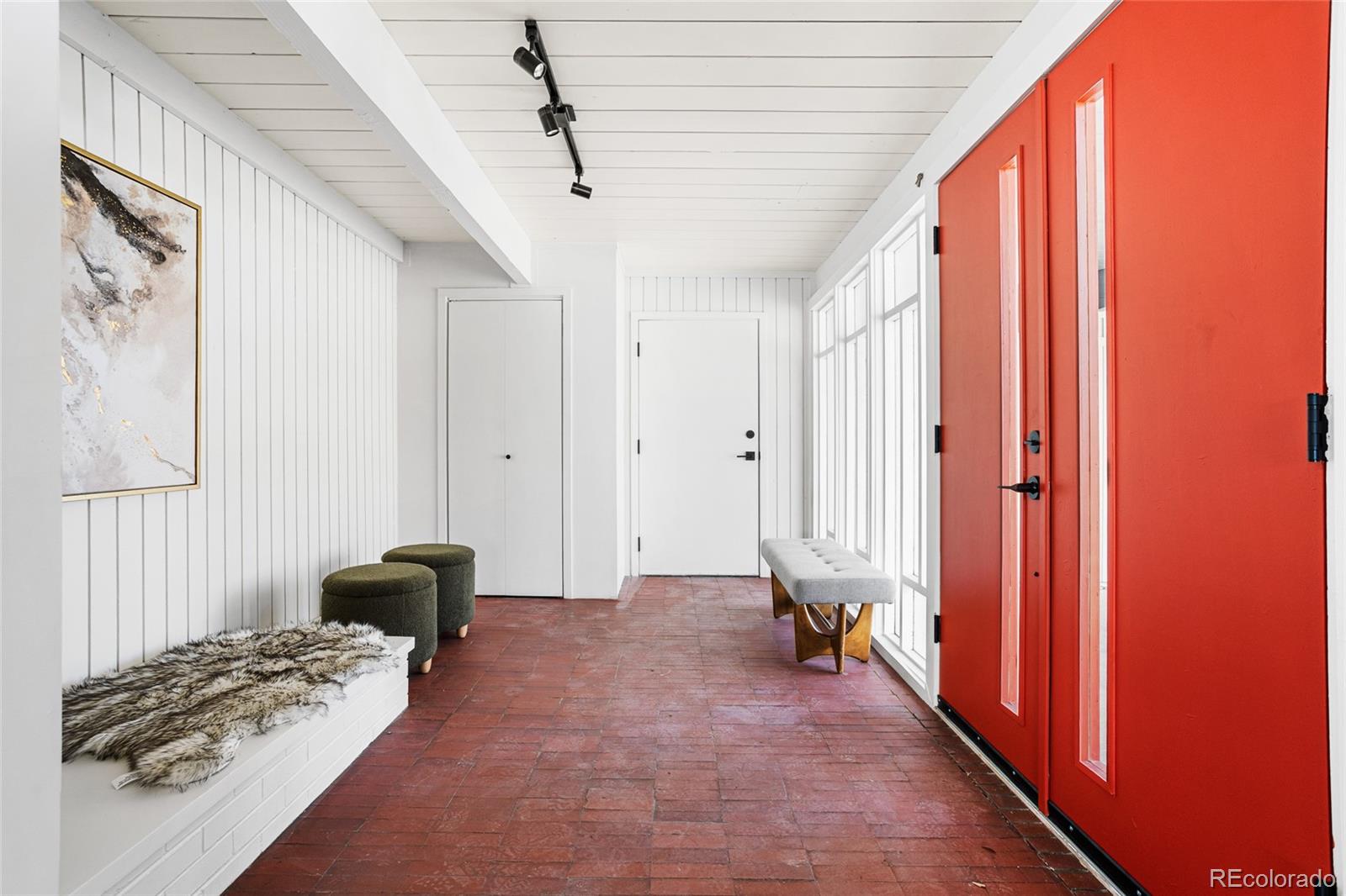 1812 South Ivanhoe Street Denver, CO 80224 - Photo 2 of 46 a view of a livingroom with furniture and entryway