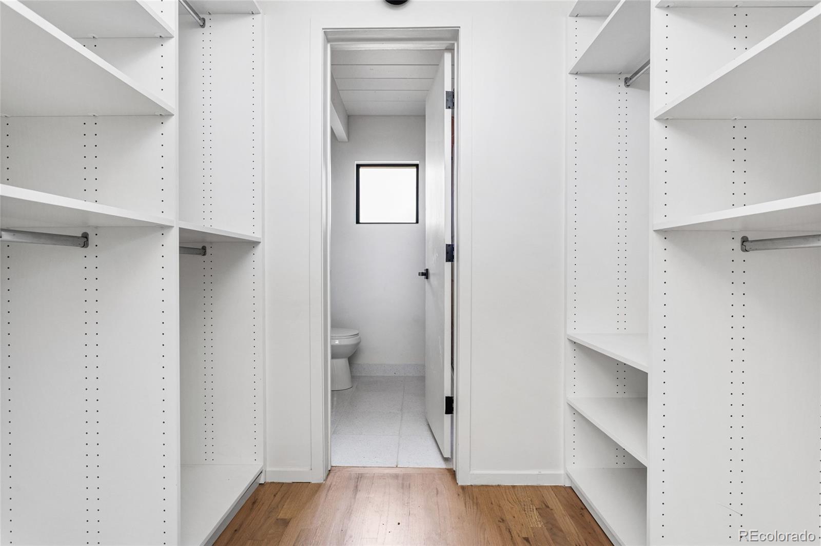 1812 South Ivanhoe Street Denver, CO 80224 - Photo 25 of 46 a view of a bathroom from a hallway