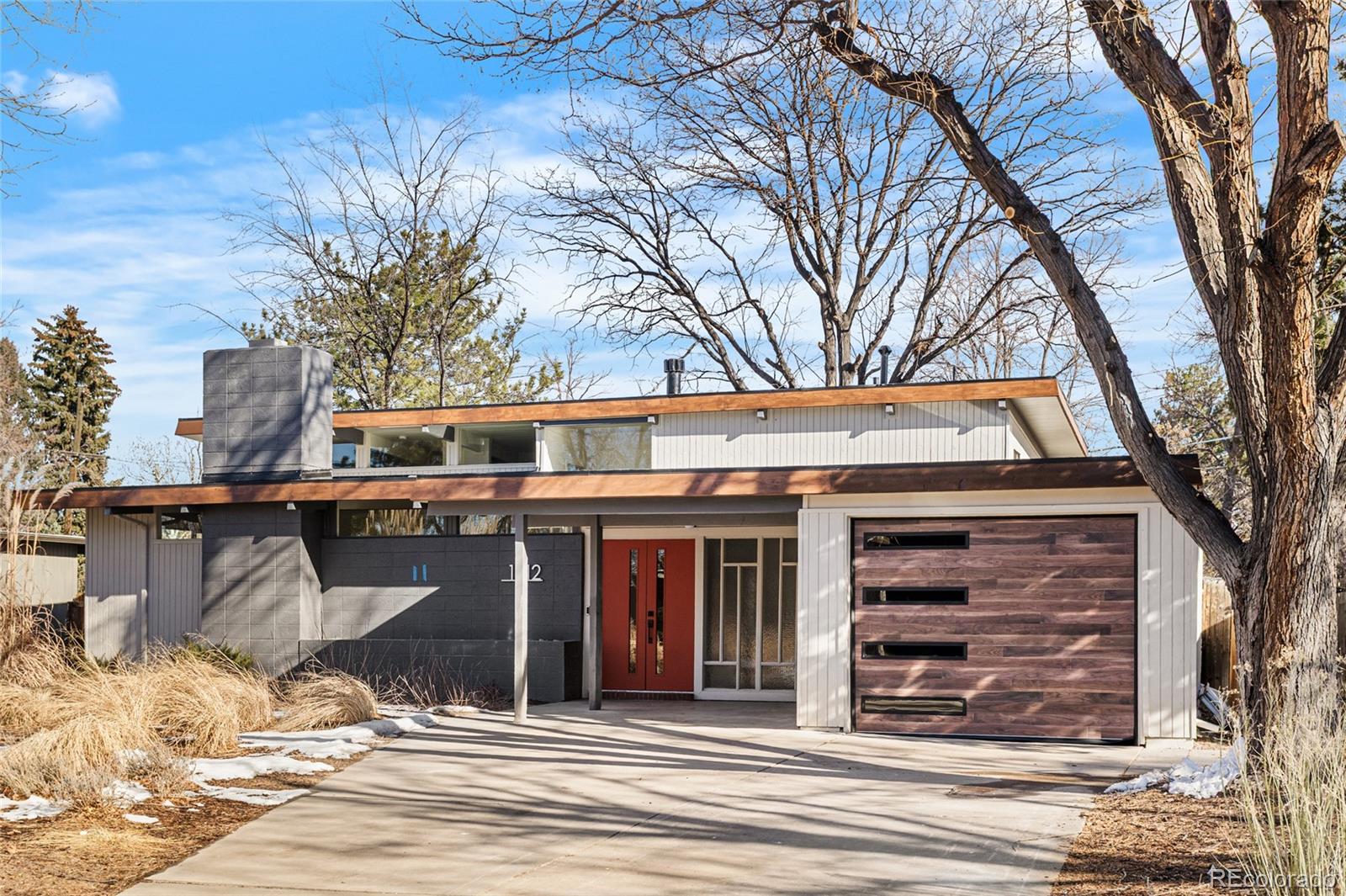 1812 South Ivanhoe Street Denver, CO 80224 - Photo 38 of 46 a view of a house with a large tree