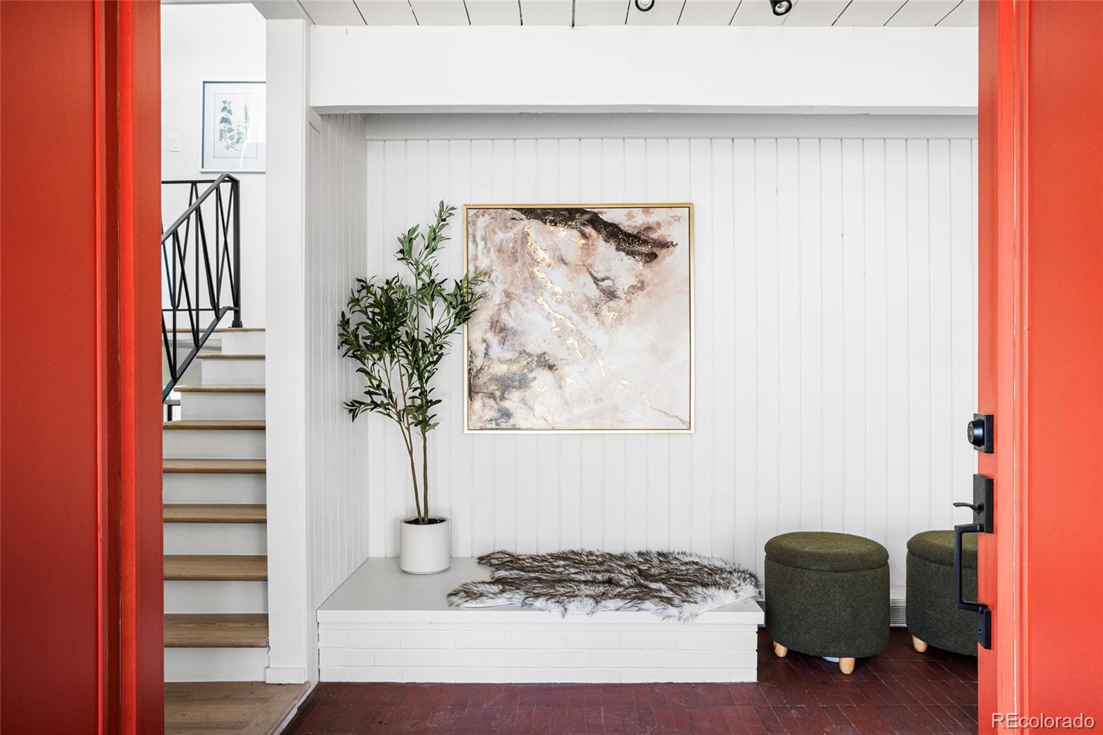 1812 South Ivanhoe Street Denver, CO 80224 - Photo 4 of 46 a picture of a hallway with a potted plant