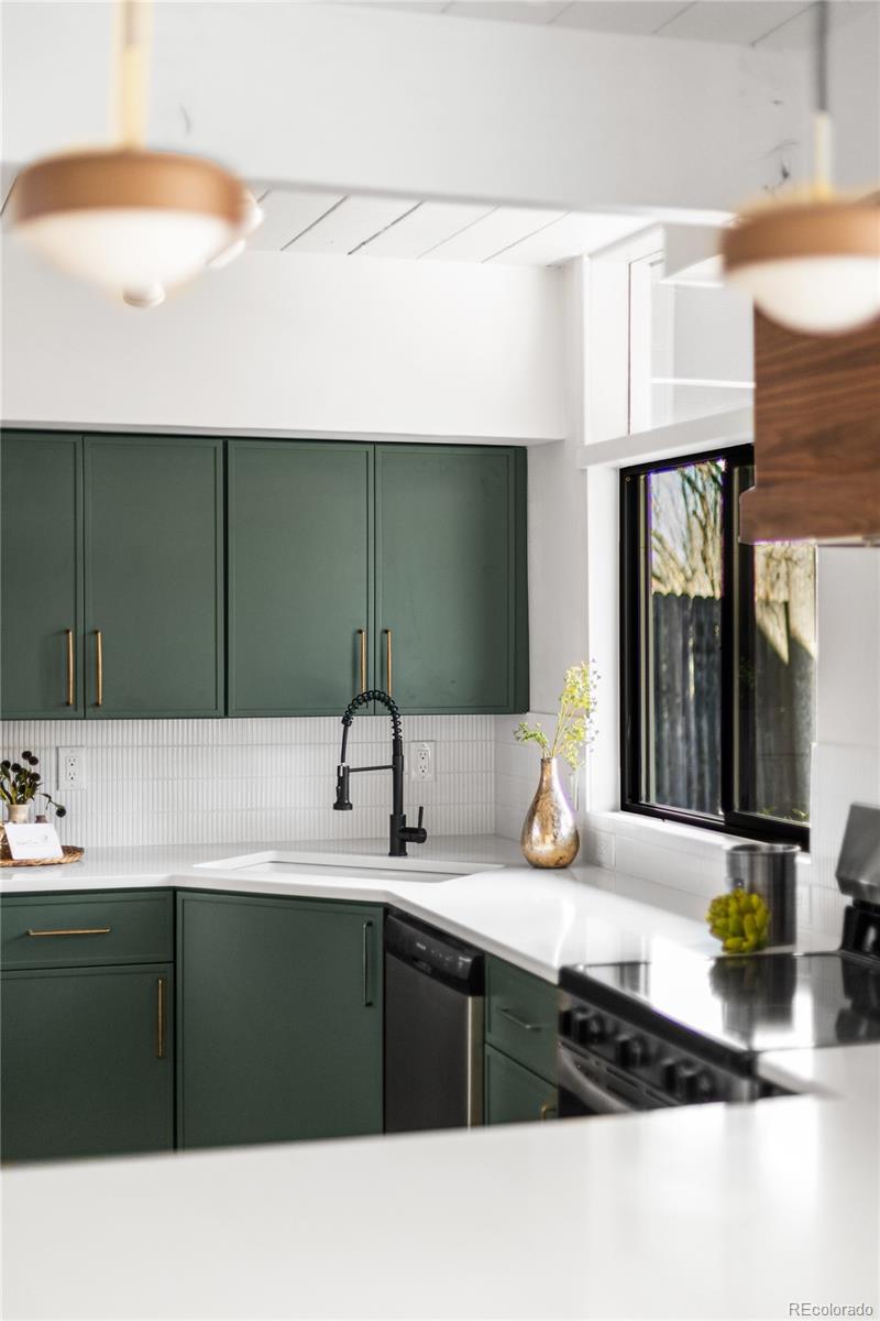 1812 South Ivanhoe Street Denver, CO 80224 - Photo 43 of 46 a kitchen with a sink and cabinets