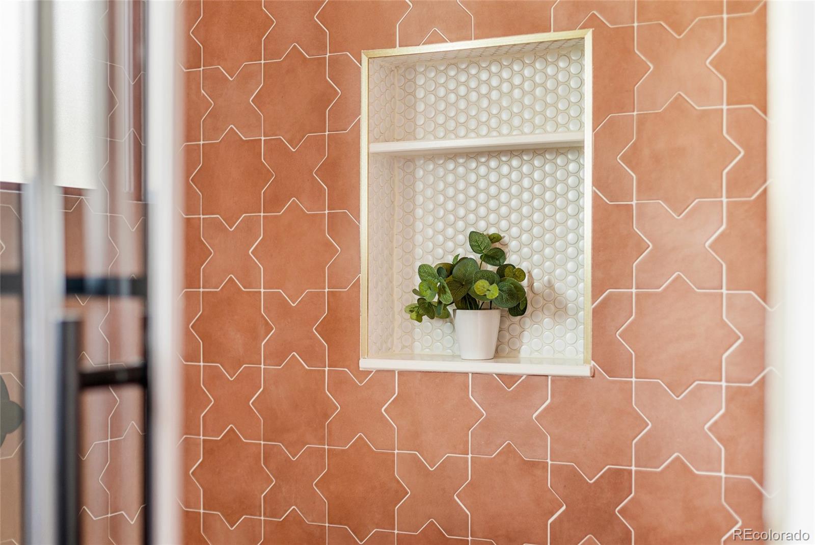 1812 South Ivanhoe Street Denver, CO 80224 - Photo 45 of 46 a view of a potted plant next to a window