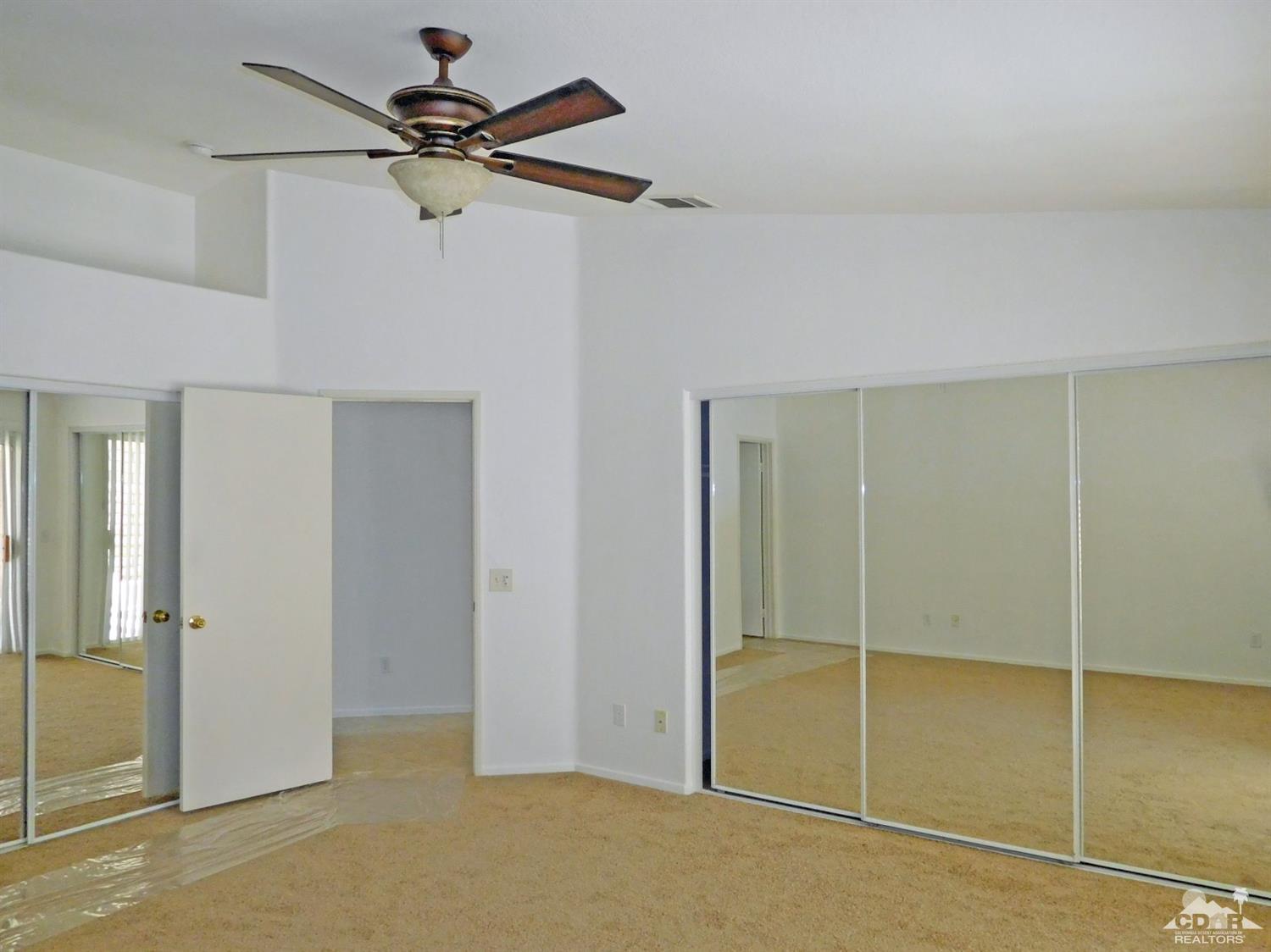 49699 Truman Way Indio, CA 92201 - Photo 11 of 19 a view of an empty room