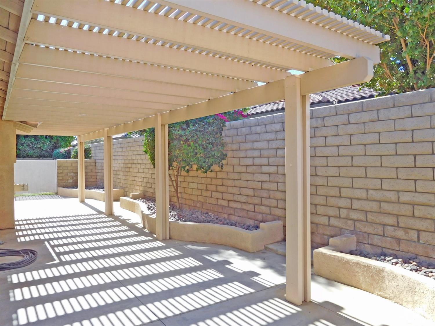 49699 Truman Way Indio, CA 92201 - Photo 16 of 19 a outdoor space of a house with a patio