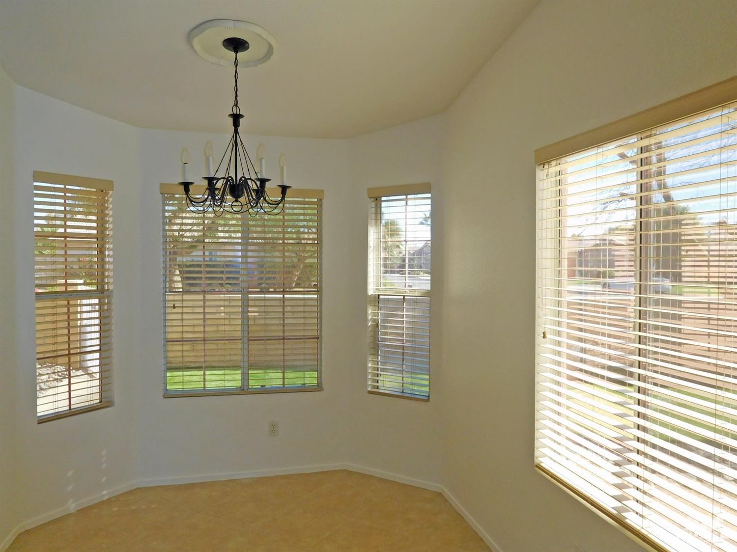 49699 Truman Way Indio, CA 92201 - Photo 10 of 19 a view of an empty room with a window