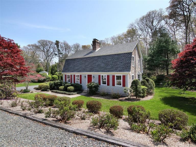 31 Hummingbird Hill Road Falmouth, MA 02540 - Photo 3 of 23 a front view of house with yard and green space