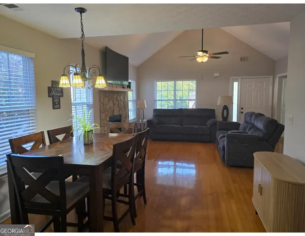 a view of a dining room with furniture