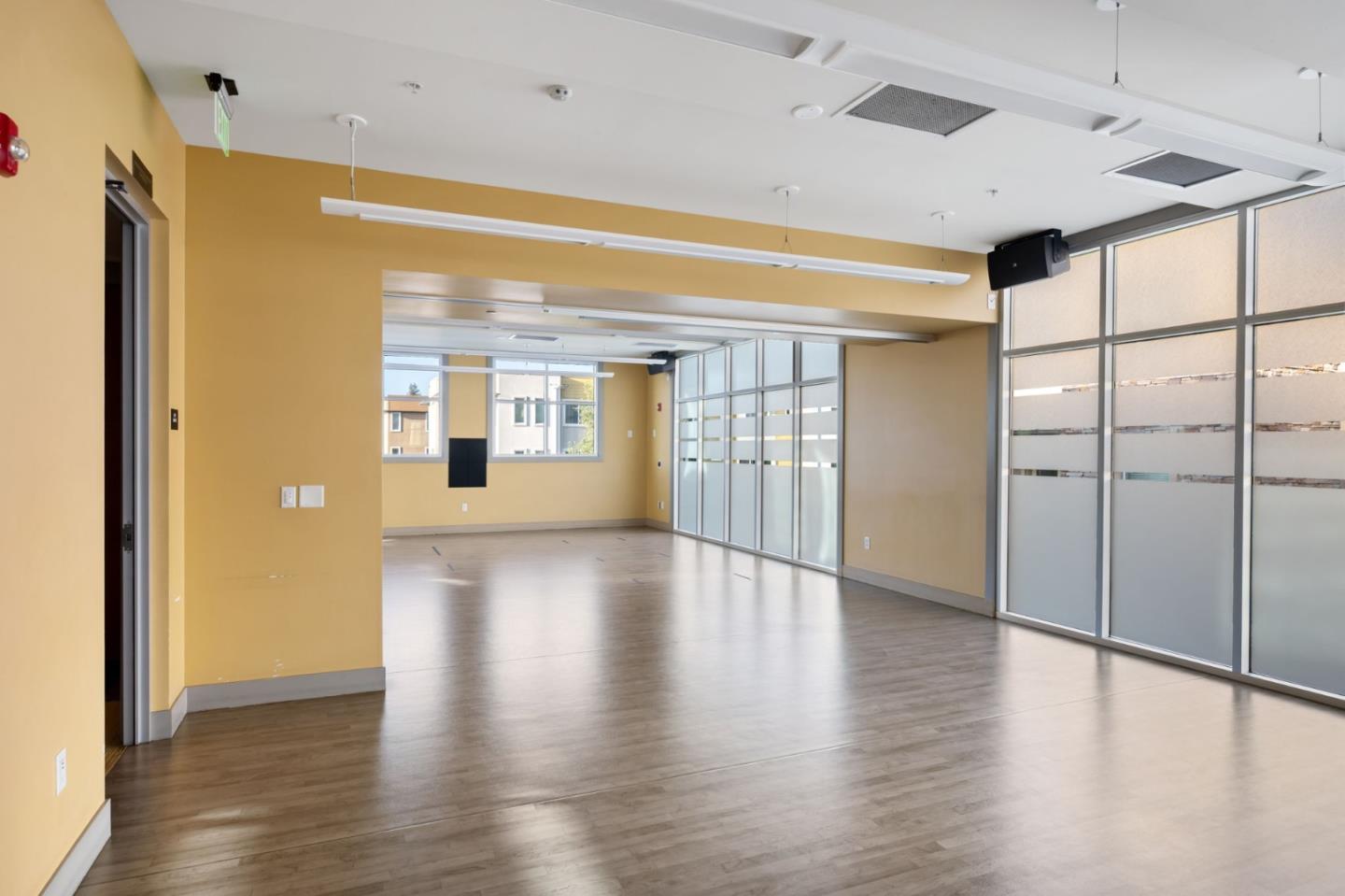5977 Larkstone Loop San Jose, CA 95123 - Photo 49 of 63 a view of an empty room with wooden floor and a window