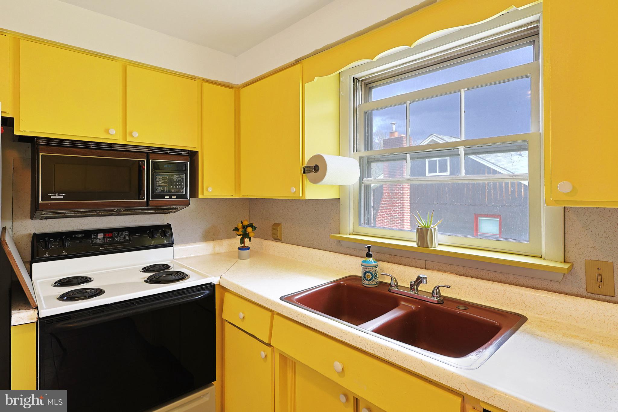 159 Rocket Center Road Keyser, WV 26726 - Photo 22 of 64 a kitchen that has a sink and a stove
