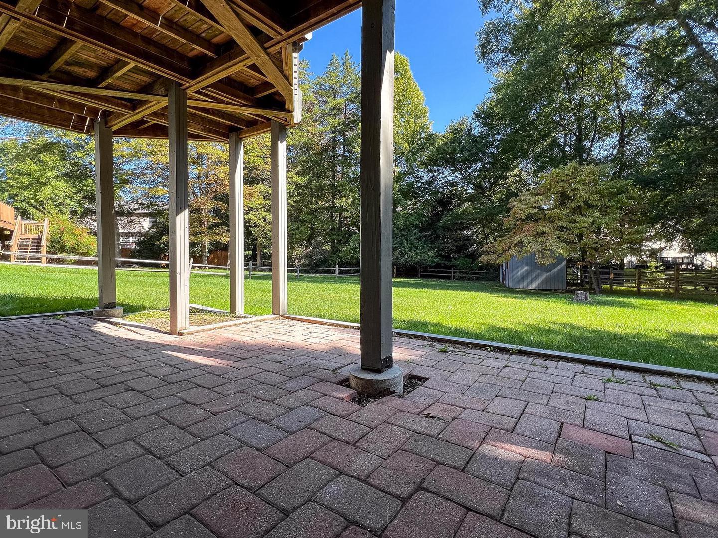 14913 Lear Lane Silver Spring, MD 20905 - Photo 31 of 33 Spacious patio with lush greenery.