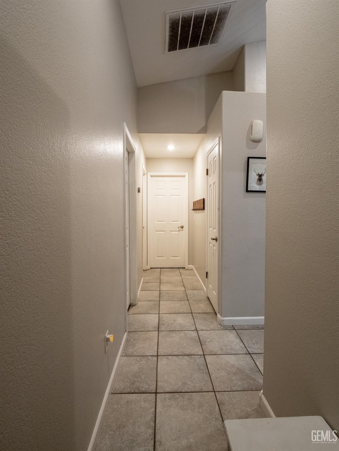 Undisclosed Address Bakersfield, CA 93312 - Photo 13 of 25 a view of a hallway