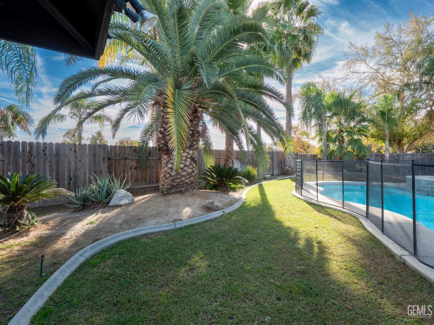 Undisclosed Address Bakersfield, CA 93312 - Photo 24 of 25 a view of a backyard