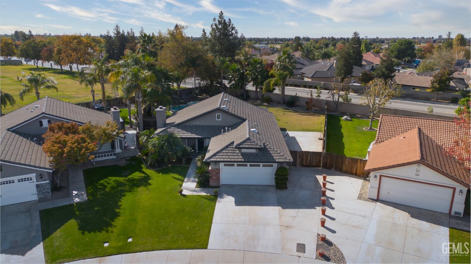 Undisclosed Address Bakersfield, CA 93312 - Photo 3 of 25 an aerial view of a house with outdoor space lake view and boat