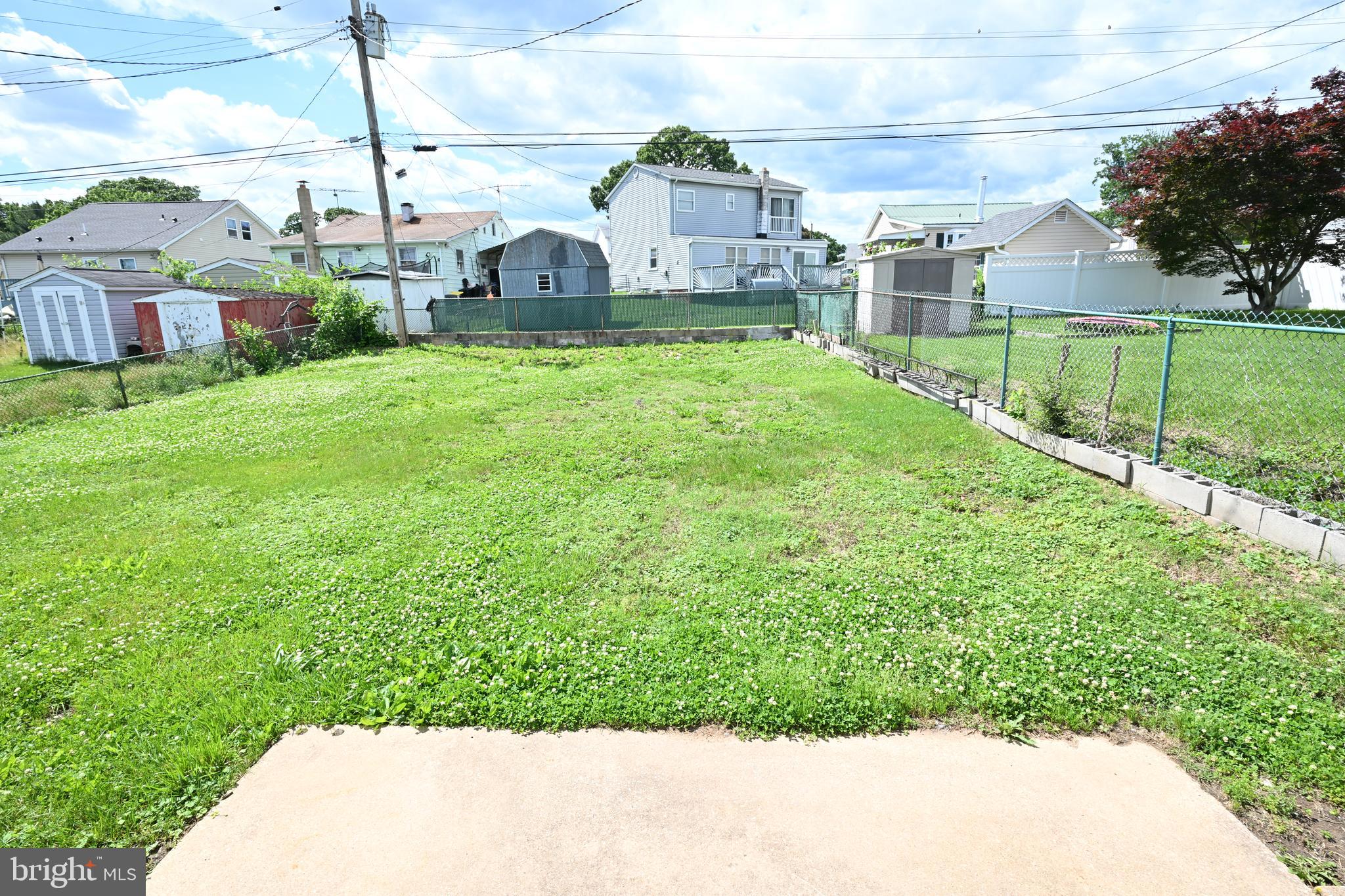 34 Compass Road East Middle River, MD 21220 - Photo 23 of 25 a front view of house with yard and green space