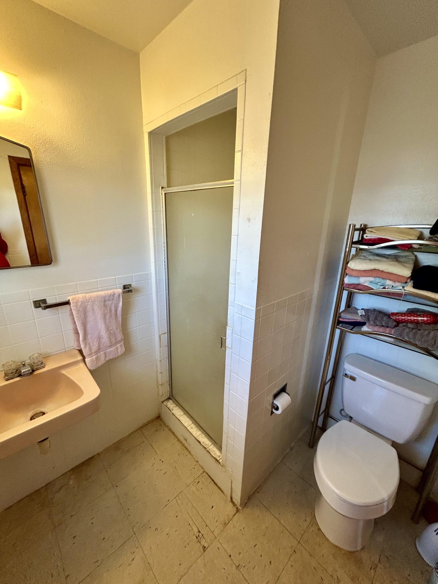 2101 Farm To Market 97 Lockney, TX 79241 - Photo 20 of 35 a bathroom with a granite countertop toilet and a sink