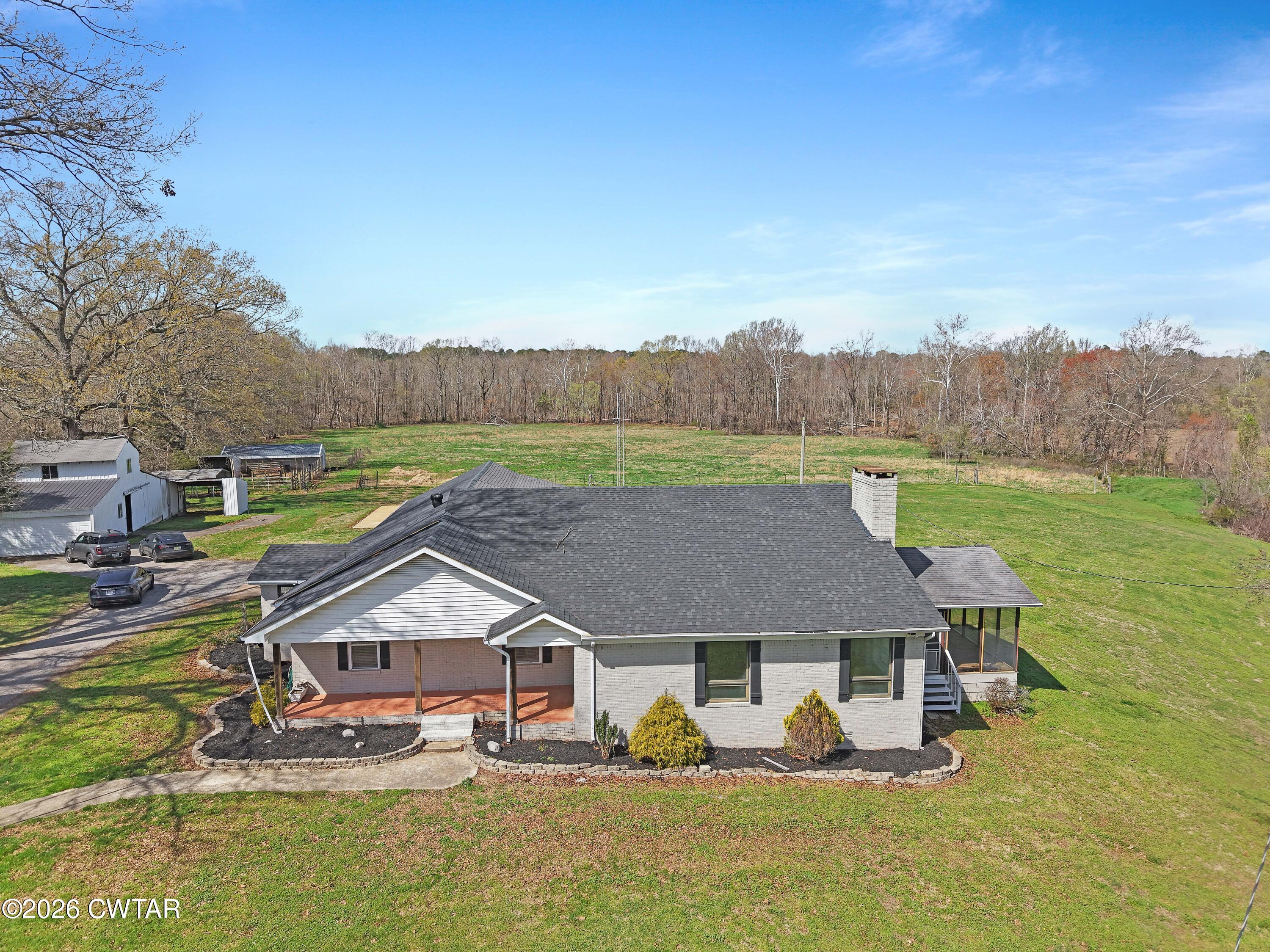 3870 Old Trezevant Road Atwood, TN 38220 - Photo 3 of 39 DJI_20260313120637_0508_D