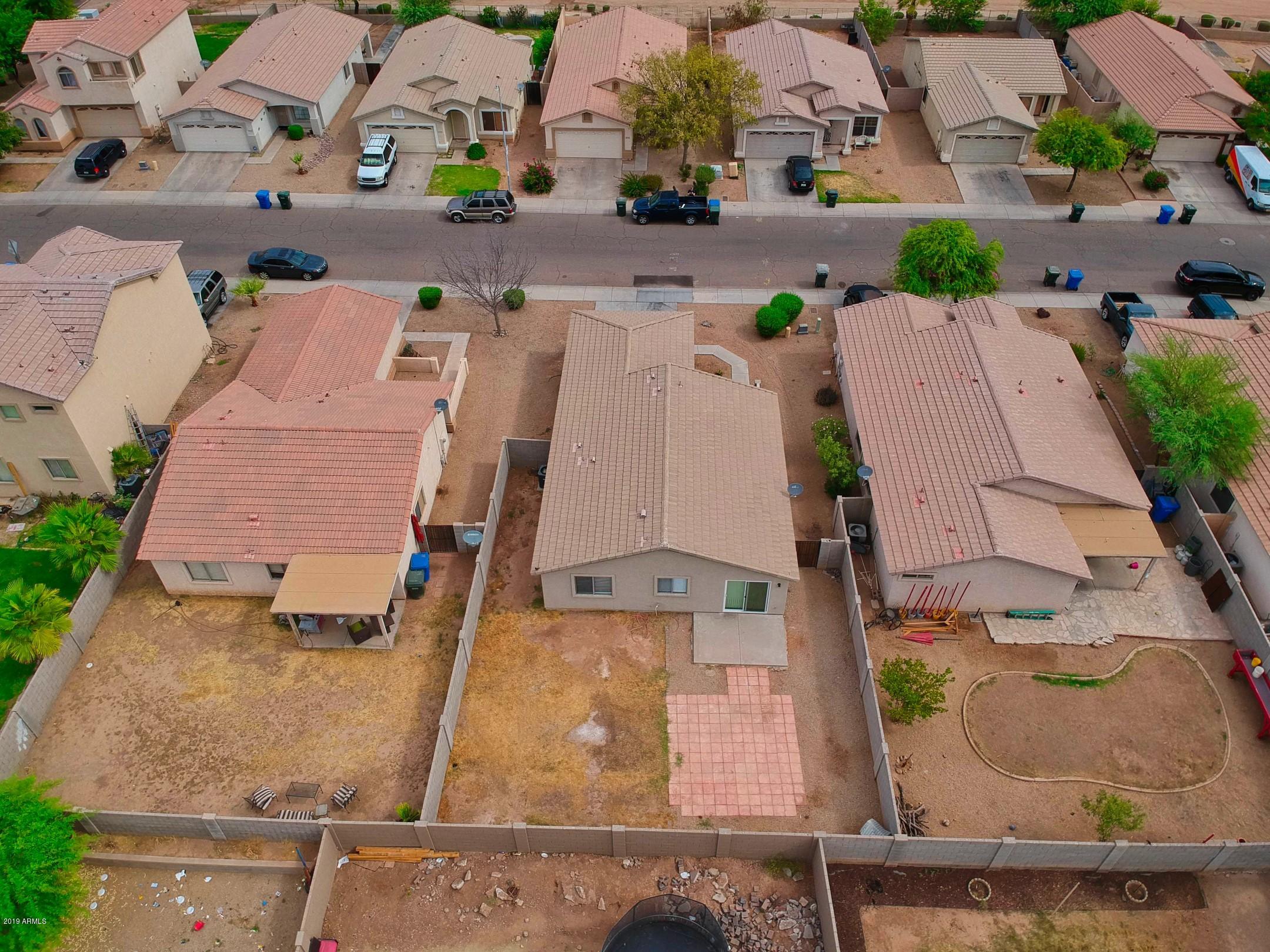 6237 West Raymond Street Phoenix, AZ 85043 - Photo 36 of 39 an aerial view of residential houses with outdoor space