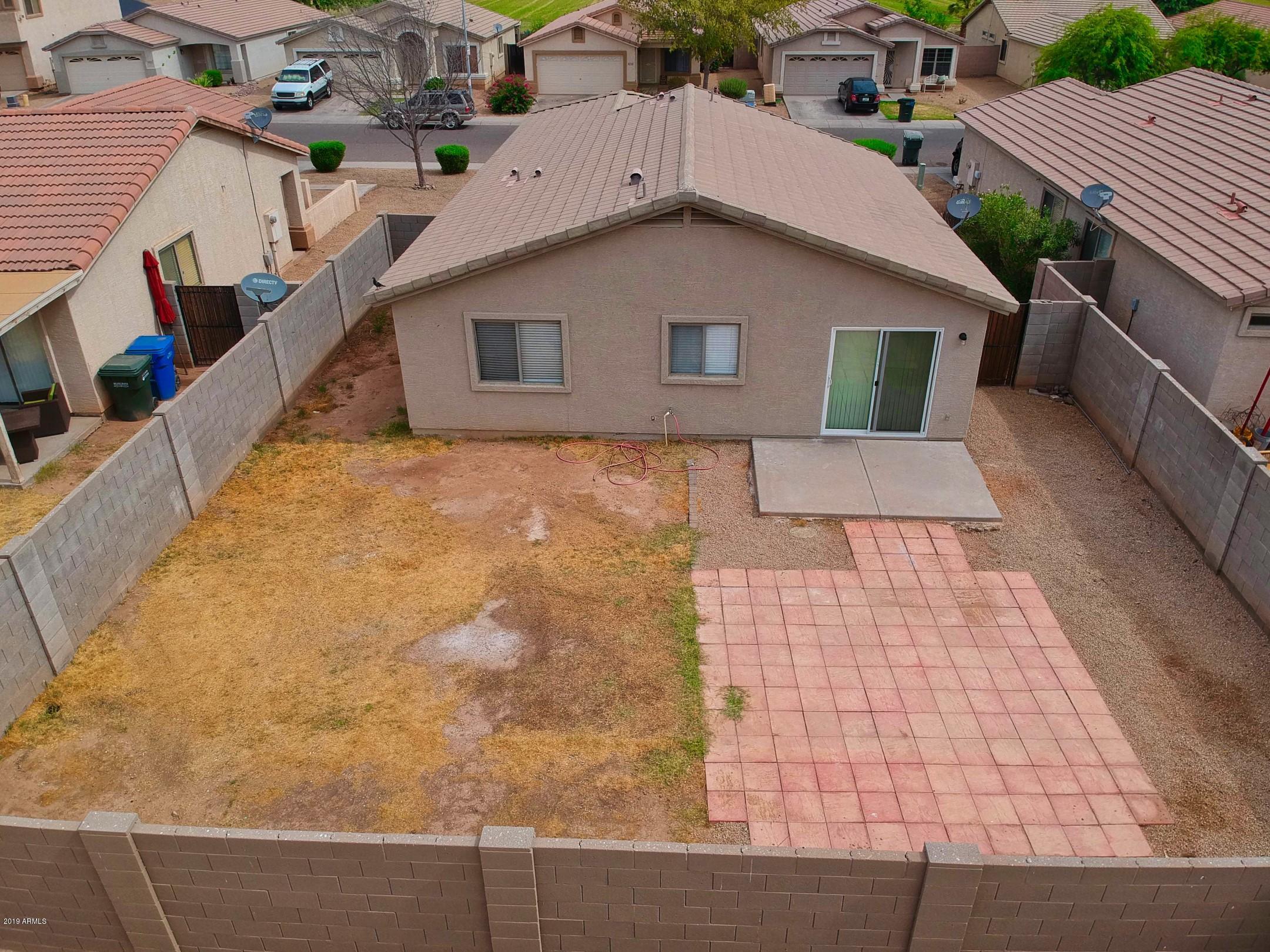 6237 West Raymond Street Phoenix, AZ 85043 - Photo 39 of 39 a aerial view of a house with entertaining space