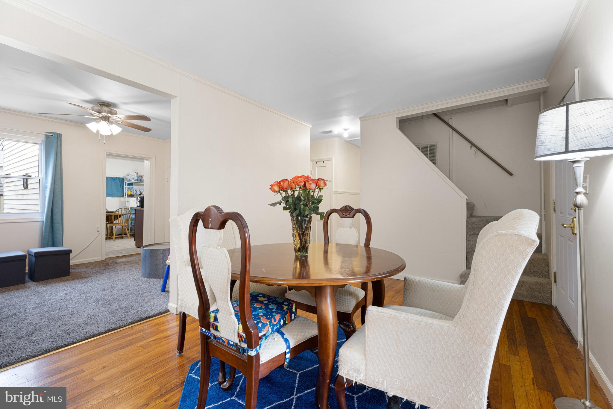 422 Elmwood Road Baltimore, MD 21206 - Photo 19 of 29 a dining room with furniture and wooden floor