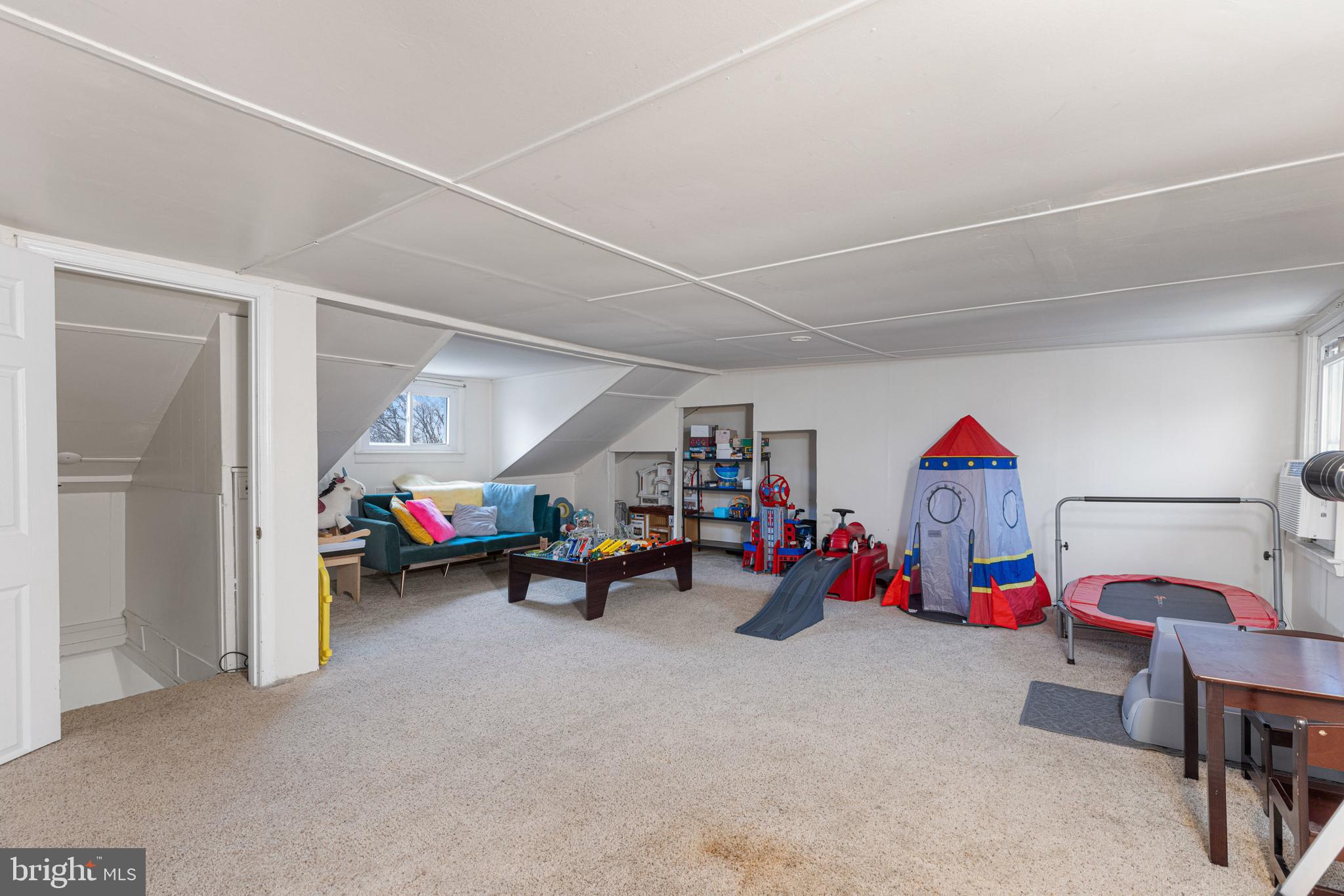 422 Elmwood Road Baltimore, MD 21206 - Photo 22 of 29 a view of play room with toys and a chandelier