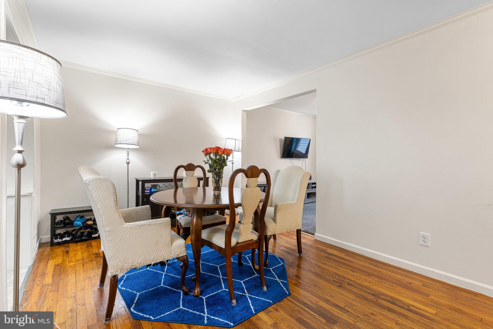 422 Elmwood Road Baltimore, MD 21206 - Photo 4 of 29 a view of a dining room with furniture and wooden floor