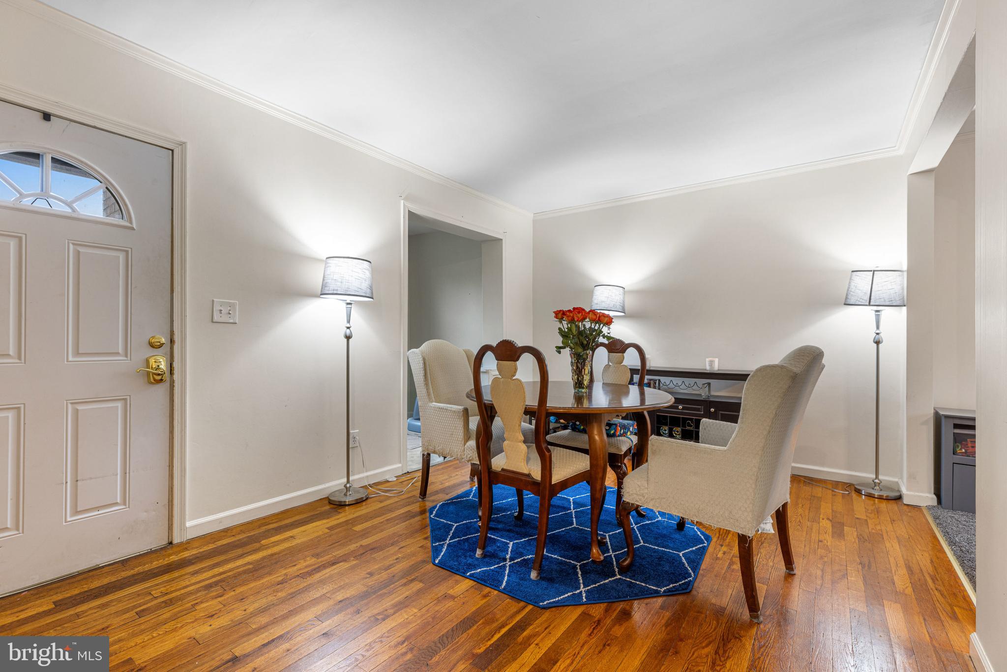 422 Elmwood Road Baltimore, MD 21206 - Photo 5 of 29 a view of a dining room with furniture and wooden floor