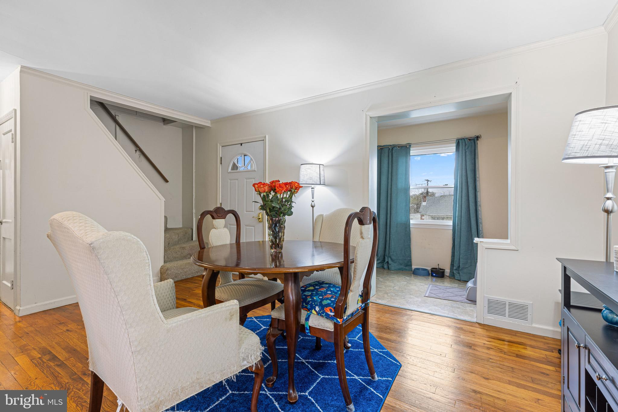 422 Elmwood Road Baltimore, MD 21206 - Photo 6 of 29 a view of a dining room with furniture and wooden floor