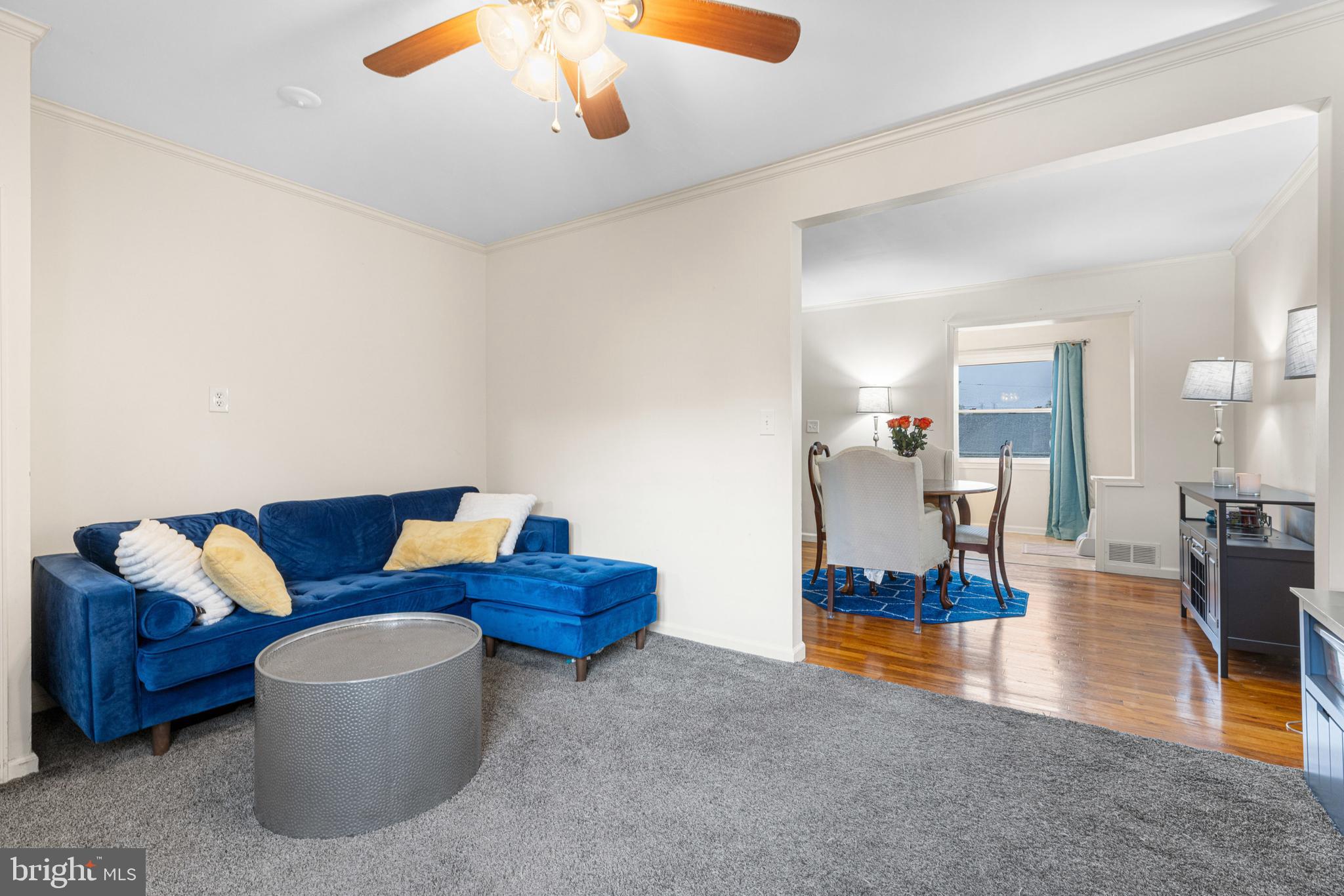 422 Elmwood Road Baltimore, MD 21206 - Photo 8 of 29 a living room with furniture and wooden floor