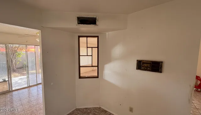 an empty room with windows