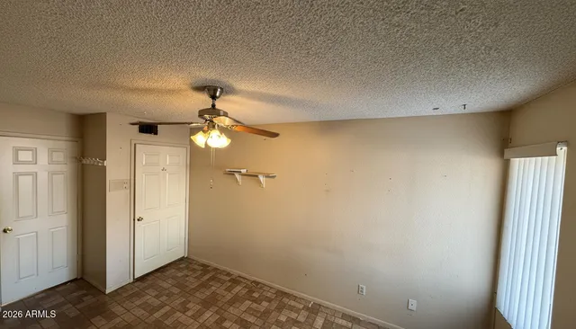 a view of a backyard with a small cabin