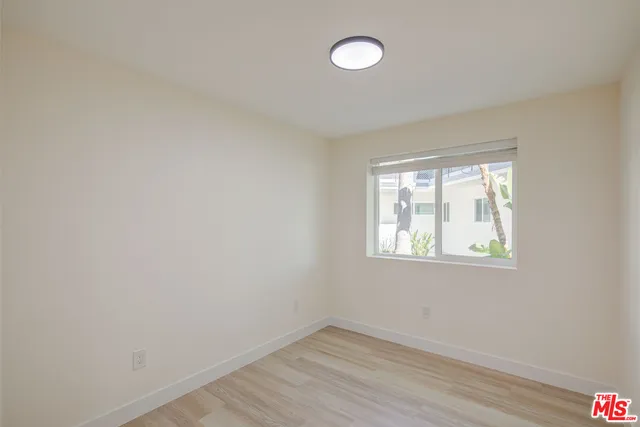 a bathroom with a toilet a sink and shower
