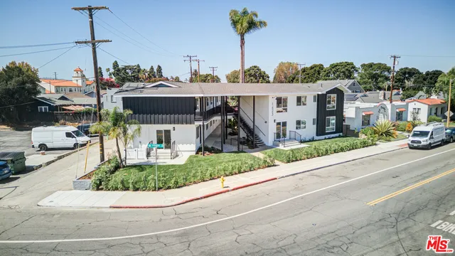 a view of a street in front of a building