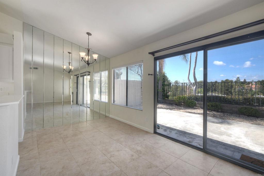 1394 Longfellow Road Vista, CA 92081 - Photo 16 of 50 a view of an empty room window and chandelier