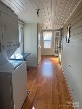 a view of livingroom with furniture and wooden floor