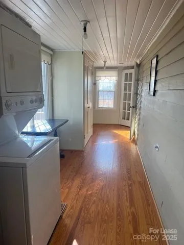 a view of livingroom with furniture and wooden floor