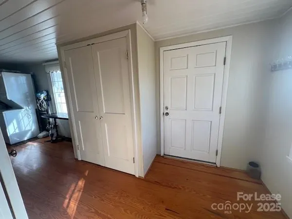 a view of small space with racks on the wall