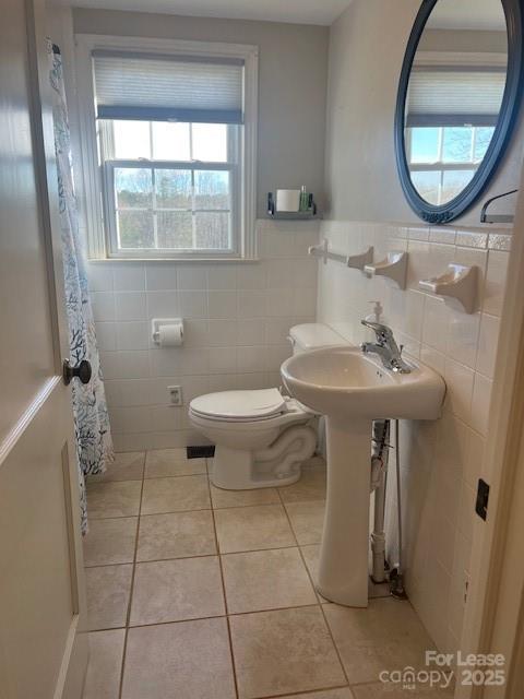 241 Cleghorn Mill Road Rutherfordton, NC 28139 - Photo 15 of 27 a bathroom with a sink toilet and a mirror
