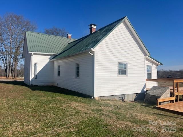 241 Cleghorn Mill Road Rutherfordton, NC 28139 - Photo 3 of 27 a view of a backyard with a cabin