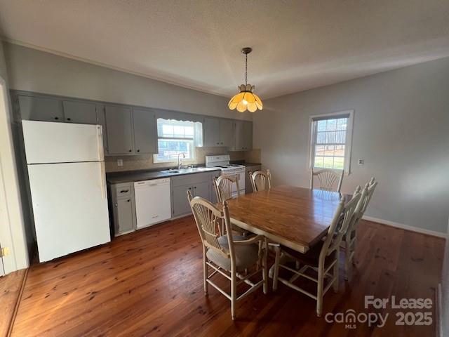 241 Cleghorn Mill Road Rutherfordton, NC 28139 - Photo 9 of 27 a view of a dining room with furniture window and wooden floor