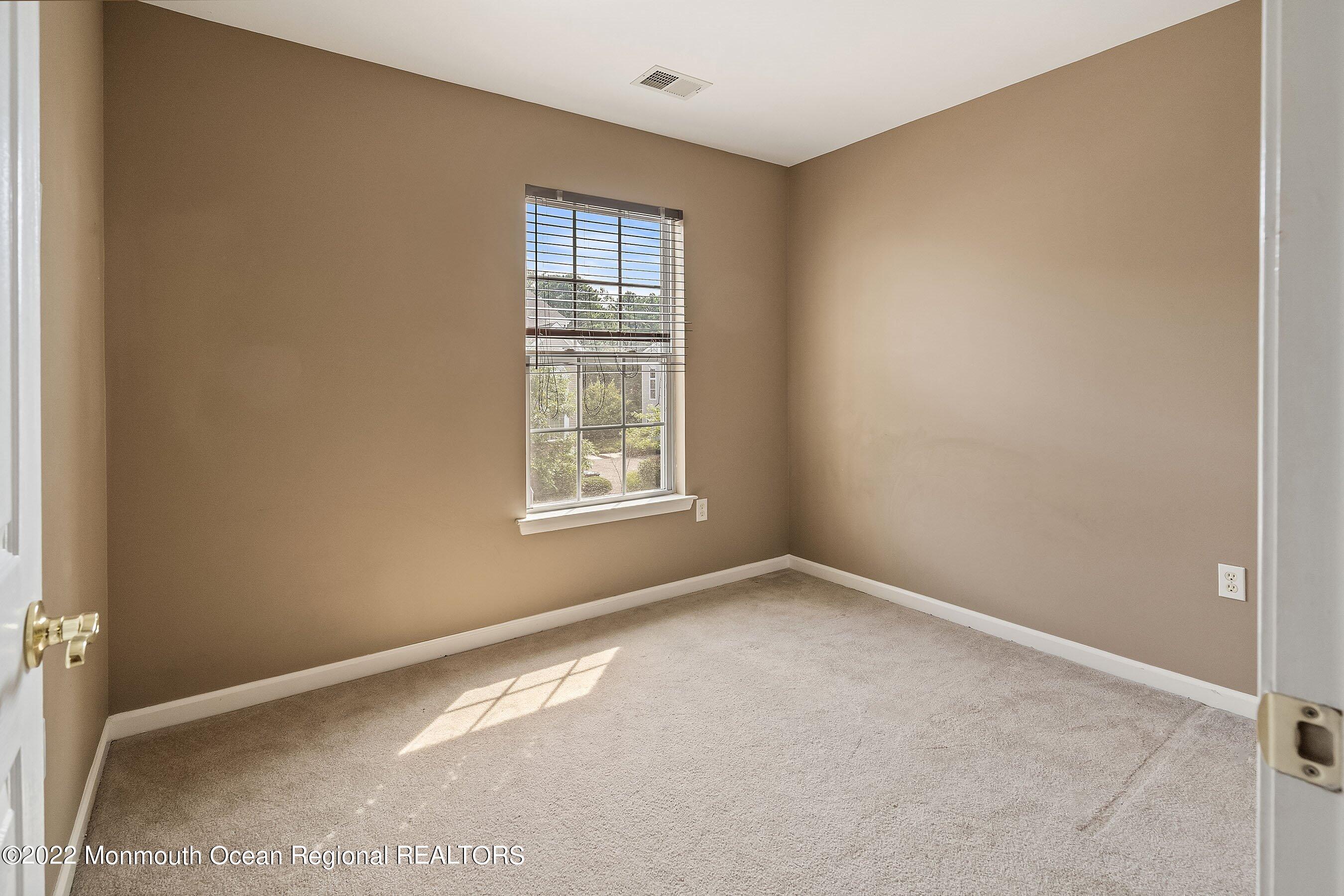 107 Bryce Lane, Unit 2004 Manahawkin, NJ 08050 - Photo 26 of 39 27-Int15 Bed1