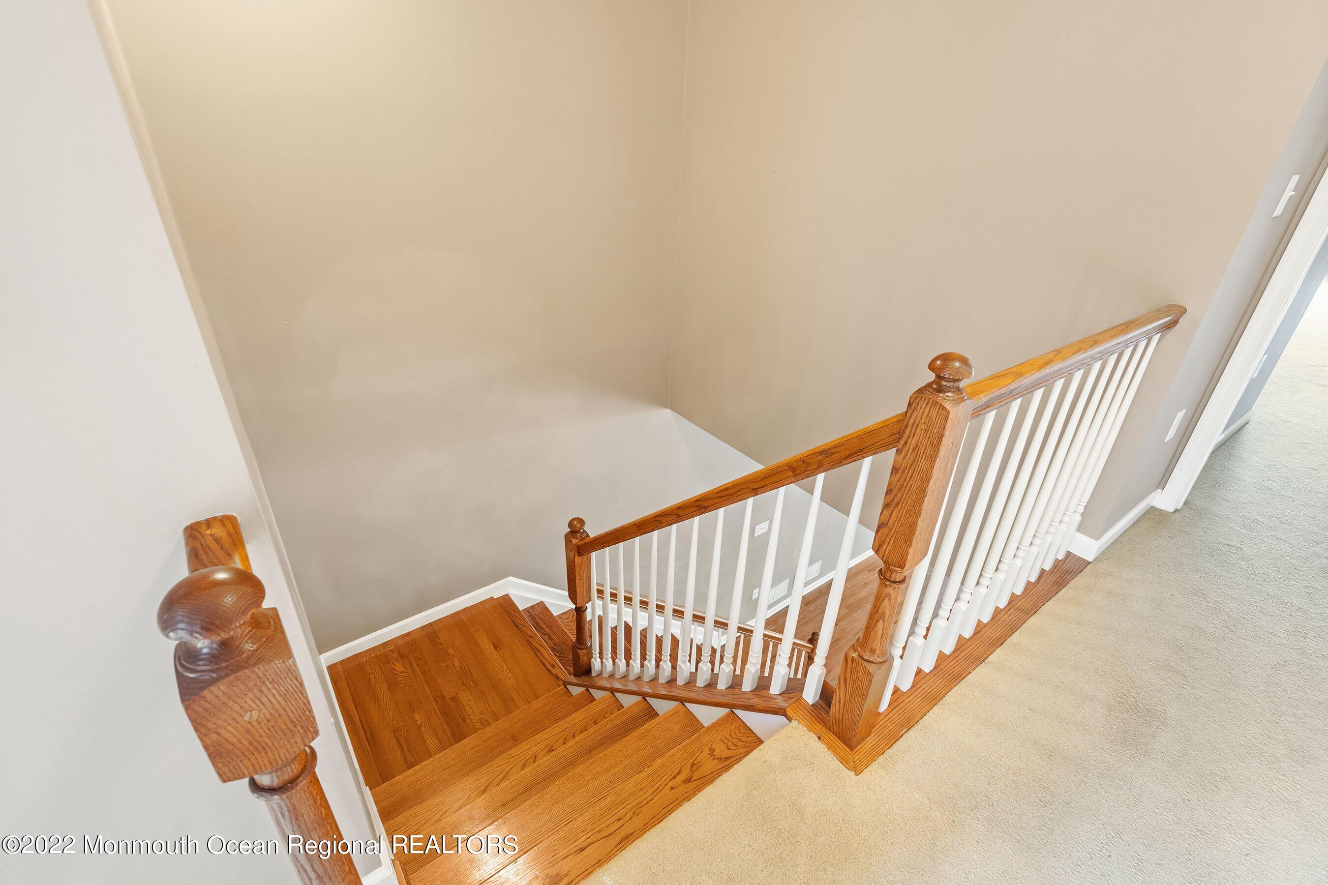 107 Bryce Lane, Unit 2004 Manahawkin, NJ 08050 - Photo 30 of 39 a view of entryway with stairs