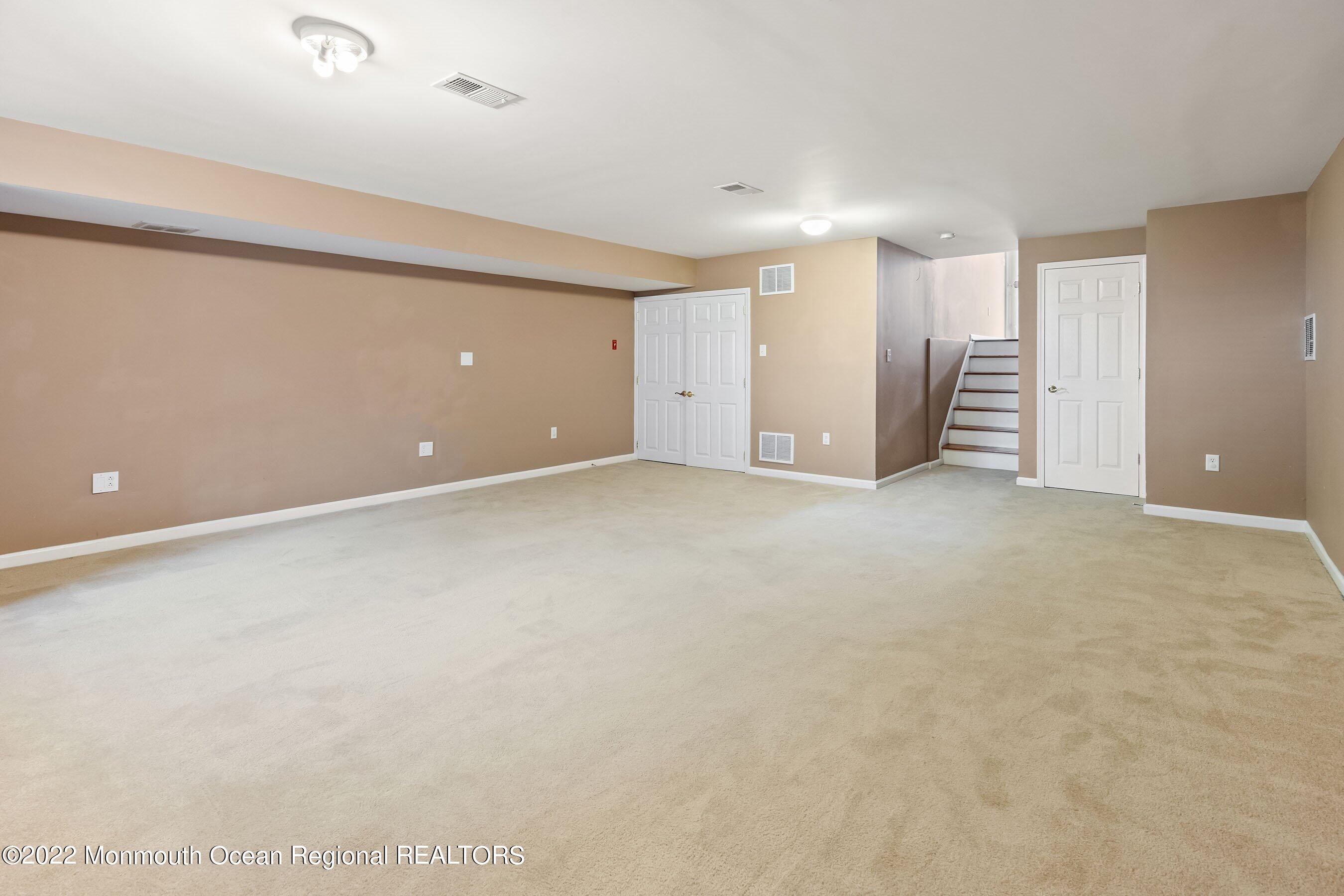 107 Bryce Lane, Unit 2004 Manahawkin, NJ 08050 - Photo 32 of 39 a view of an empty room