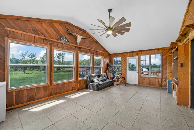 a bathroom with a sink a vanity and a mirror